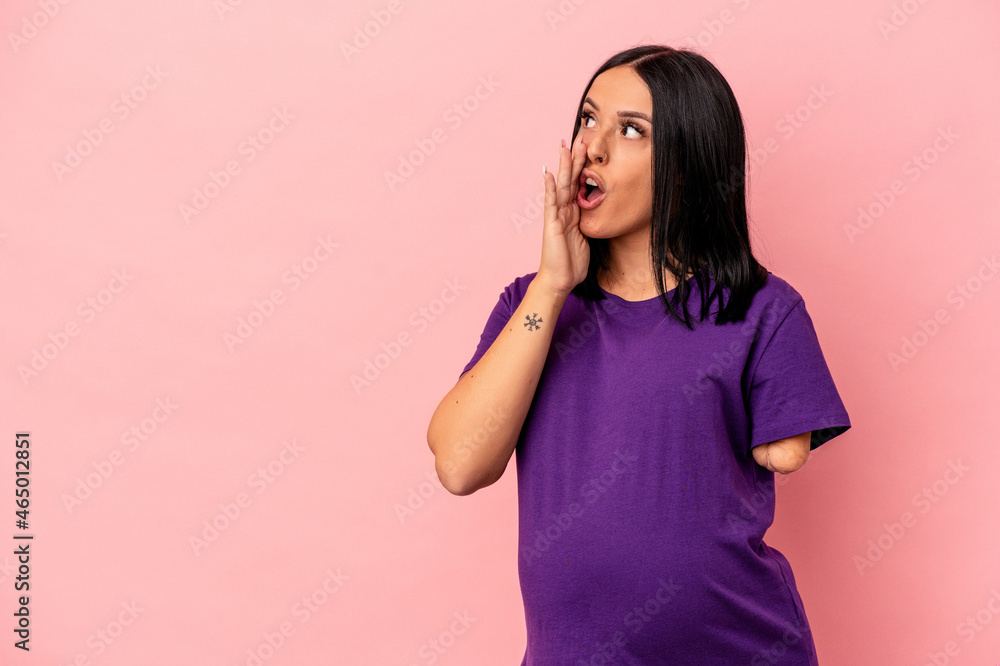 Young pregnant woman with one arm isolated on pink background is saying a secret hot braking news and looking aside Young pregnant woman with one arm isolated on pink background is saying a secret hot braking news and looking aside
