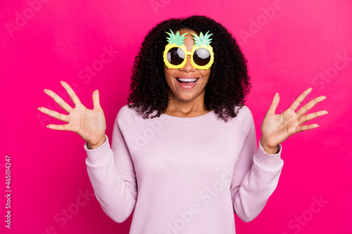 Photo of impressed young brunette lady wear pink sweater eyewear isolated on magenta color background