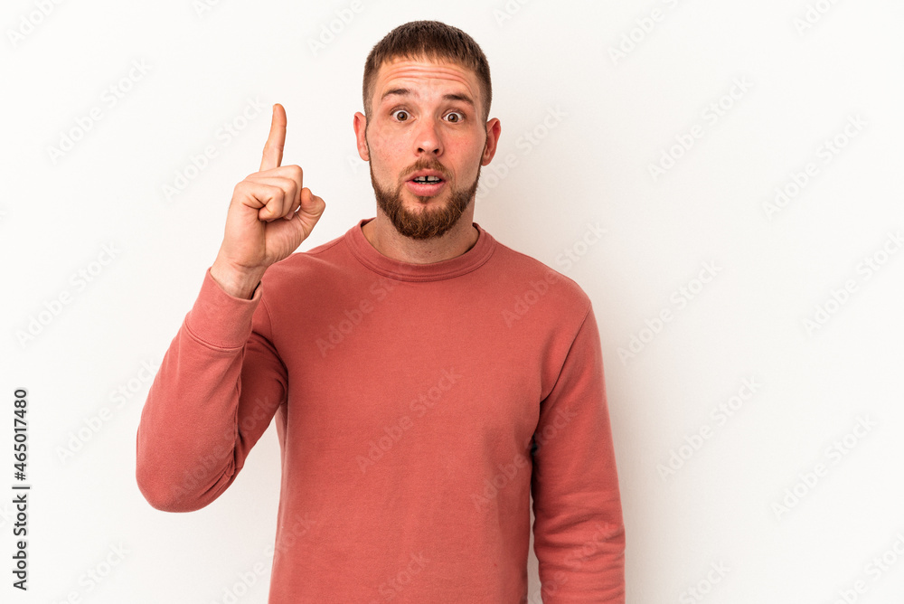 Young caucasian man with diastema isolated on white background having some great idea, concept of creativity. Young caucasian man with diastema isolated on white background having some great idea, concept of creativity.