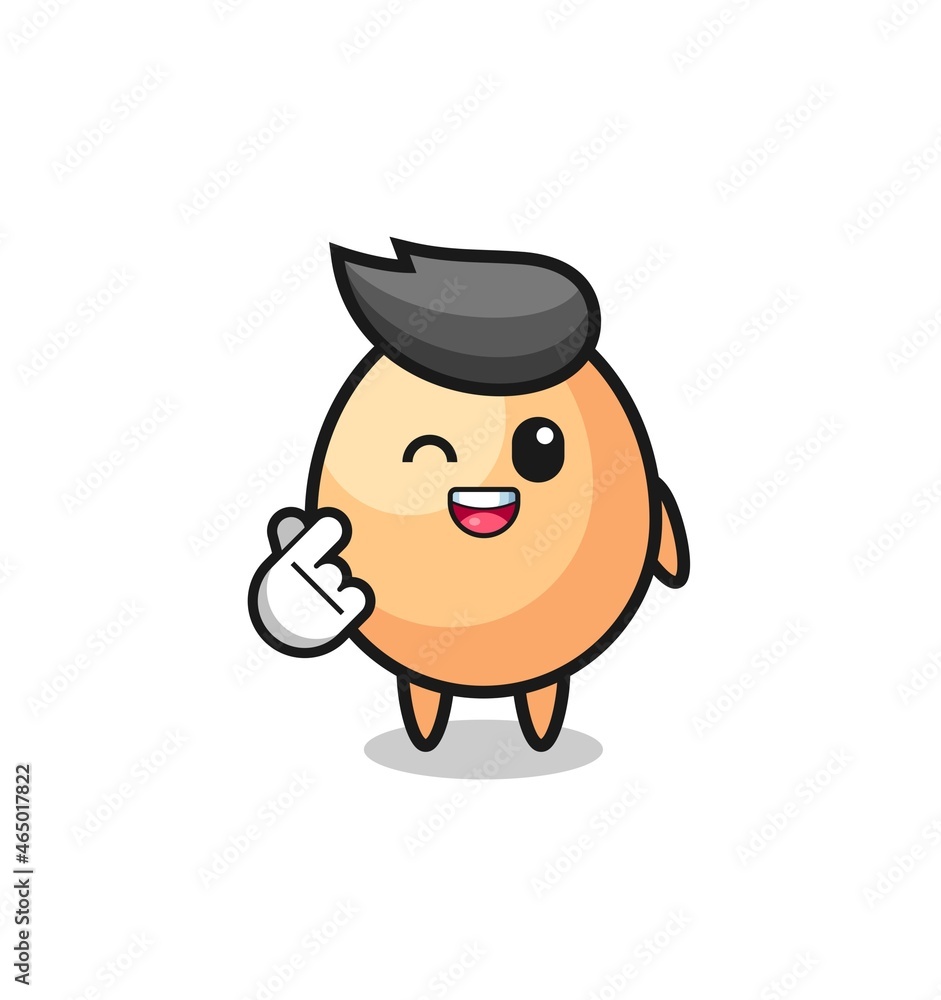 egg character doing Korean finger heart