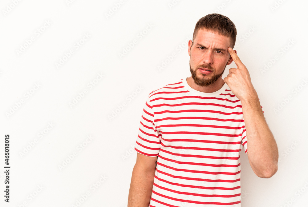 Young caucasian man with diastema isolated on white background showing a disappointment gesture with forefinger. Young caucasian man with diastema isolated on white background showing a disappointment gesture with forefinger.