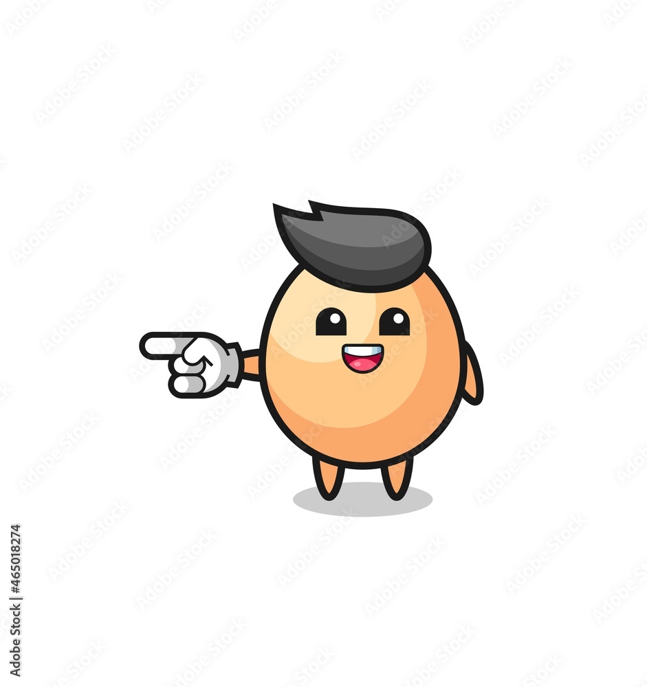 egg cartoon with pointing left gesture egg cartoon with pointing left gesture
