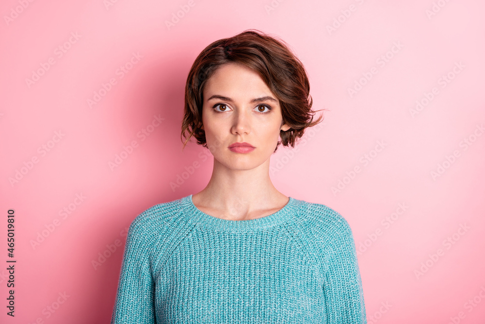 Photo of serious young nice charming woman wear blue pullover isolated on pastel pink color background Photo of serious young nice charming woman wear blue pullover isolated on pastel pink color background