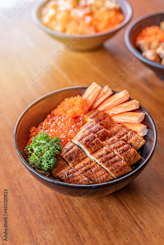 Japanese grilled eel served over rice photo