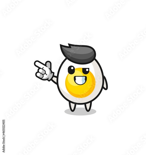 boiled egg mascot pointing top left © heriyusuf