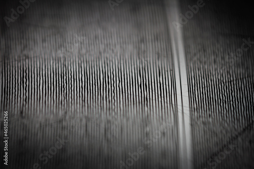 Macro shot of vinyl record showing scratches