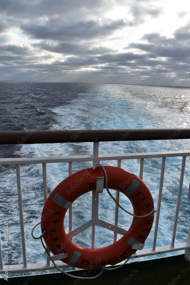 A life preserver on the deck of a ship