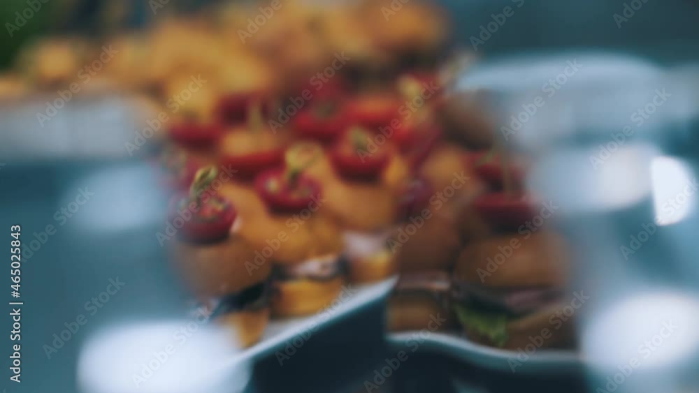 Mini burgers on the buffet at the hotel Mini burgers on the buffet at the hotel