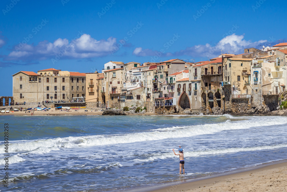 View from a beach in historic part of Cefalu town on Sicily Island, Italy