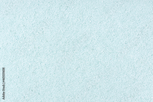 Turquoise colored sand background texture. Full frame