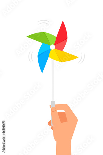 Hand holding wind spinner image. Clipart image