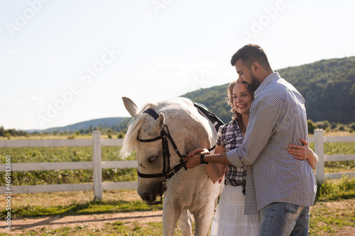 The couple in love spending time together on a ranch