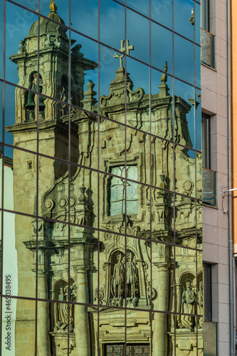 Reflection in glass facade of the Church of San Jorge in the city of A Coruna, in Galicia, Spain  photo