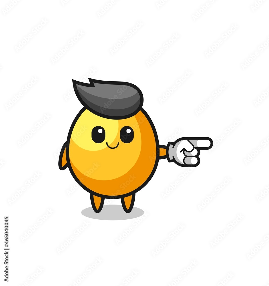 golden egg mascot with pointing right gesture golden egg mascot with pointing right gesture
