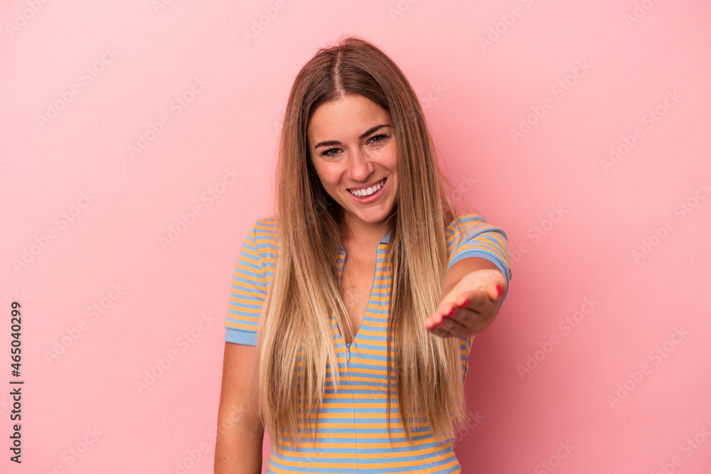 Young Russian woman isolated on pink background shocked covering mouth with hands. Young Russian woman isolated on pink background shocked covering mouth with hands.
