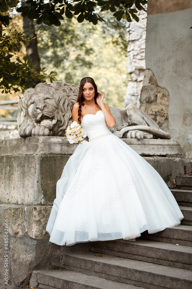Bride posing in the summer old city Bride posing in the summer old city