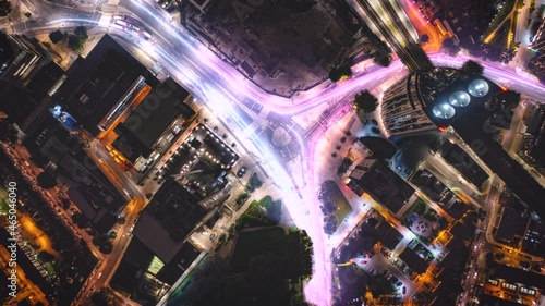 Top down hyperlapse of traffic light trails on night city streets - 3d animation photo