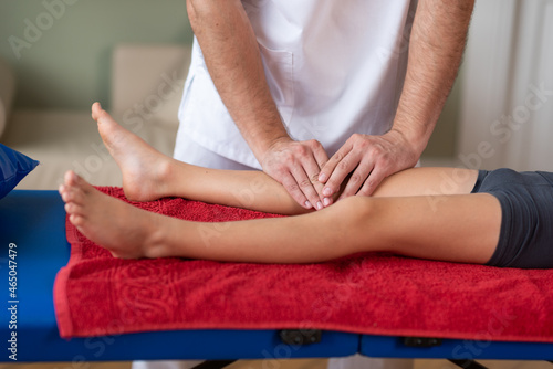 Wellness massage for children. Hands of the masseur close-up. Physiotherapist working with patient in clinic © Ольга Апанасенко