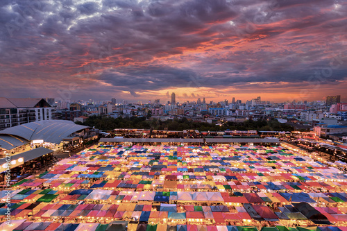 Bird eyes view of Multi-colored tents /Sales of second-hand market at twilight. © funfunphoto