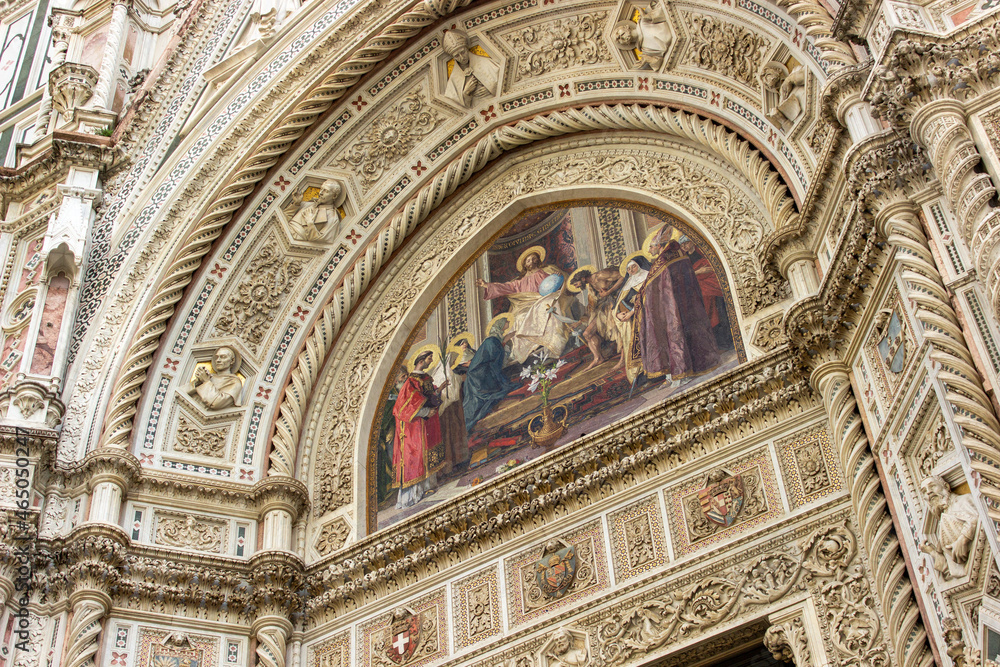 Beautiful detailed close up of the fresco above the entrance of the Florence's Cathedral (Duomo di Firenze), Italy