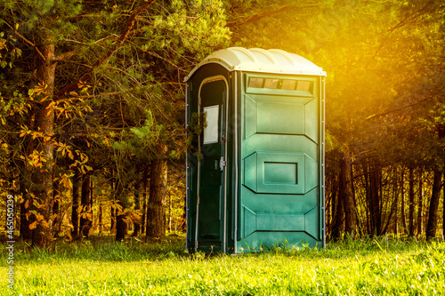 Green portable toilet photo