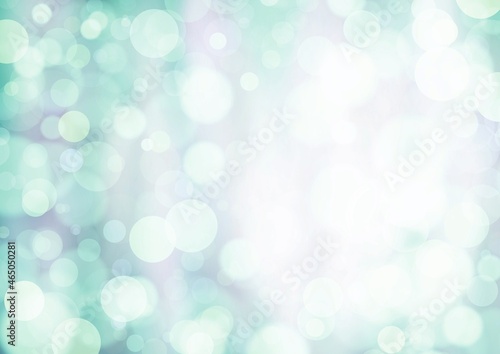 Green background with bokeh effect, blur and gradient. Colorful blurred texture. Modern design for an abstract background. Bokeh texture. Space for graphic design and creative conceptual ideas.