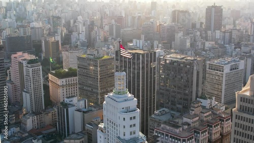 Altino Arantes building, Sao Paulo, Brazil. Santander Lighthouse museum with state flag. Altino Arantes building, Sao Paulo city, Brazil. Santander Lighthouse  museum with state flag. photo