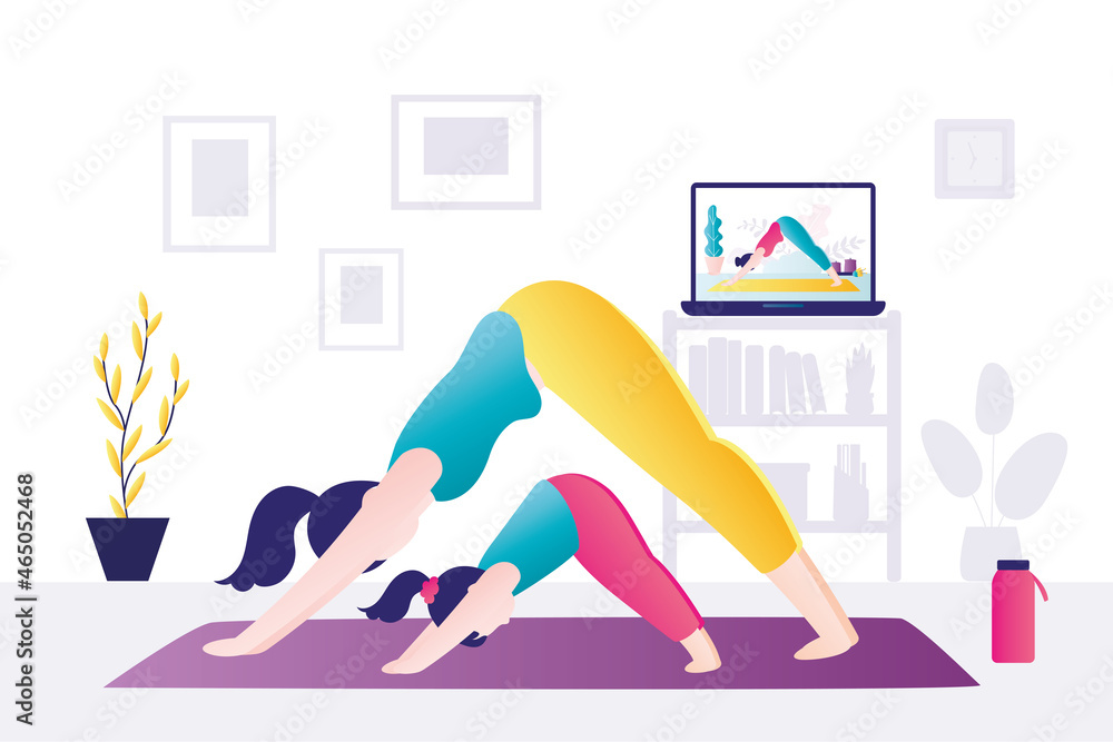 Mom and daughter stand in yoga pose, downward - facing dog. Woman and kid practice yoga together. Remote sports activities. Family leads healthy lifestyle. Online course on laptop. Mom and daughter stand in yoga pose, downward - facing dog. Woman and kid practice yoga together. Remote sports activities. Family leads healthy lifestyle. Online course on laptop.