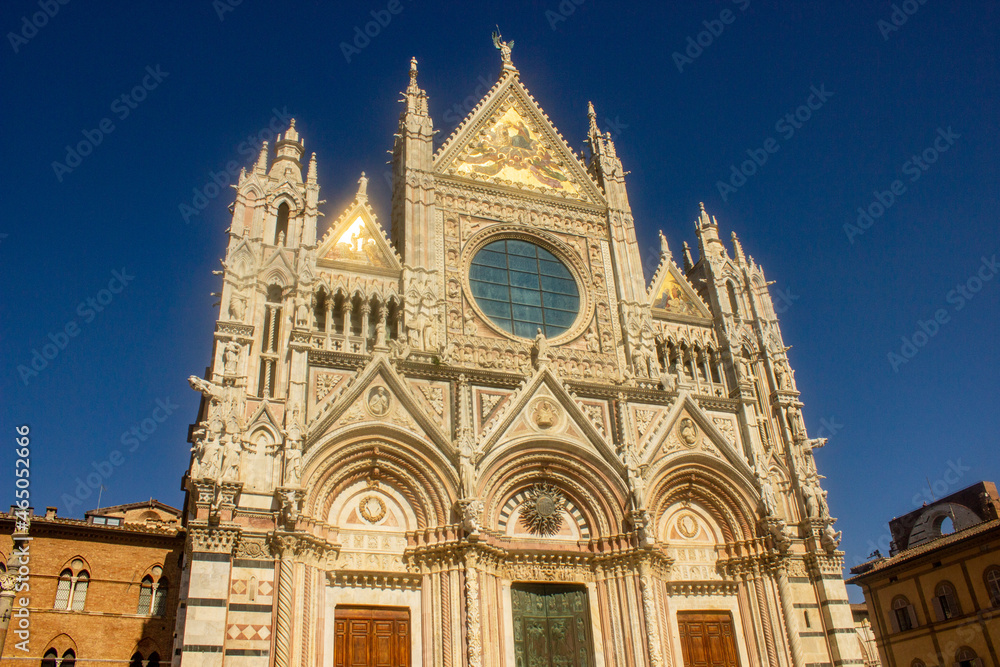 Front of the Cathedral of Siena on a clear bleu sky day (Duomo di Siena), Italy