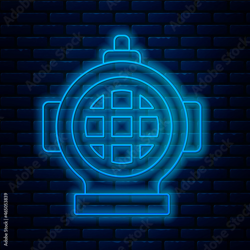 Glowing neon line Aqualung icon isolated on brick wall background. Diving helmet. Diving underwater equipment. Vector