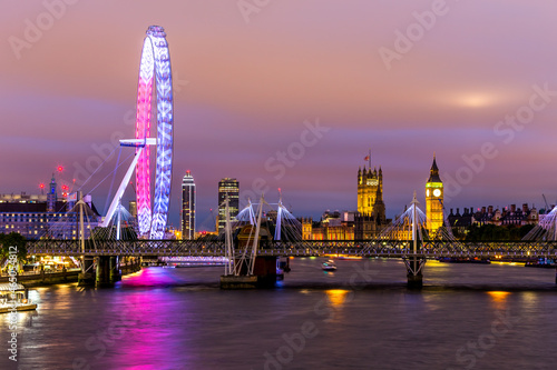 Big Ben and the London Eye in London at night
