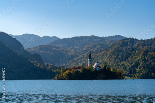 view of the St. Mary's Church and island on Lake Bled in Slovenia in late autumn © makasana photo