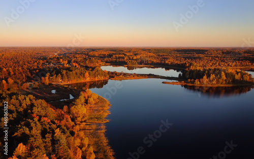 Amazing panoramic sunset aerial view of dense forests and deep clean lakes. "Smolenskoye Poozerye" National Park in Smolensk Oblast near the Russian border with Belarus.