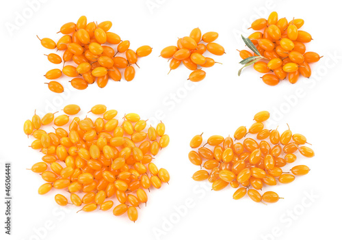 Set with fresh ripe sea buckthorn berries on white background, top view