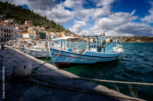 Small traditional fishing boat in a greek harbour