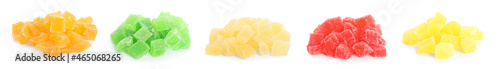 Set with tasty pieces of candied fruits on white background. Banner design