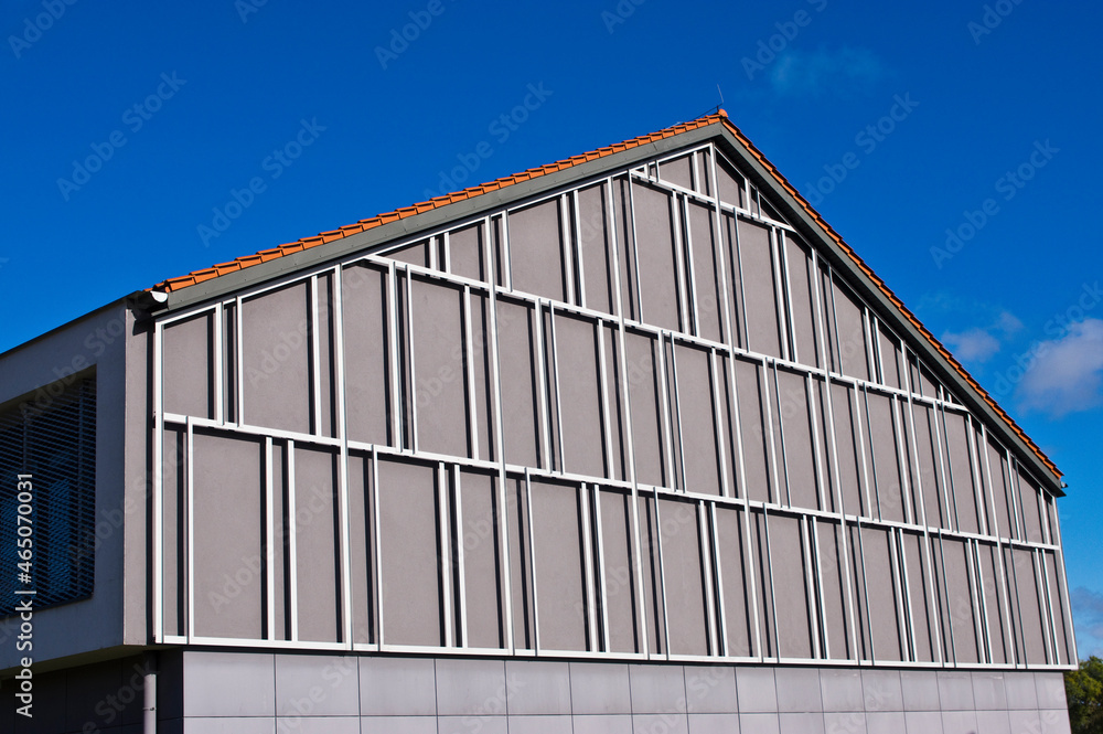 Modern gymnasium building, geometric facade pattern