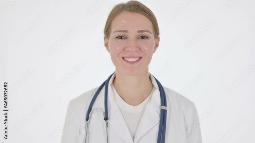 Female Doctor showing Thumbs Up Sign on White Background Female Doctor showing Thumbs Up Sign on White Background