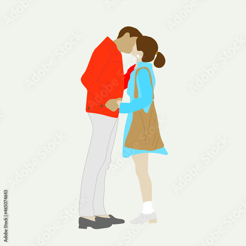 A couple in love kissing. A guy and a girl holding hands.