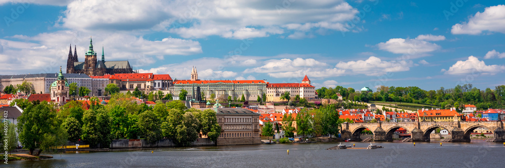 Prague scenic spring aerial view of the Prague Old Town pier architecture Charles Bridge over Vltava river in Prague, Czechia. Old Town of Prague with the Castle in the background, Czech Republic.