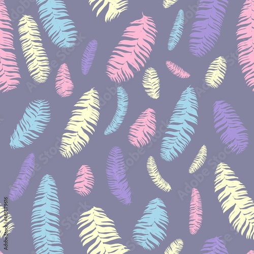 Seamless background pattern from tropical leaves.