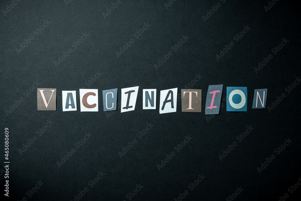 Obraz premium Vaccination words. Caption, heading made of letters with different fonts on a dark background.
