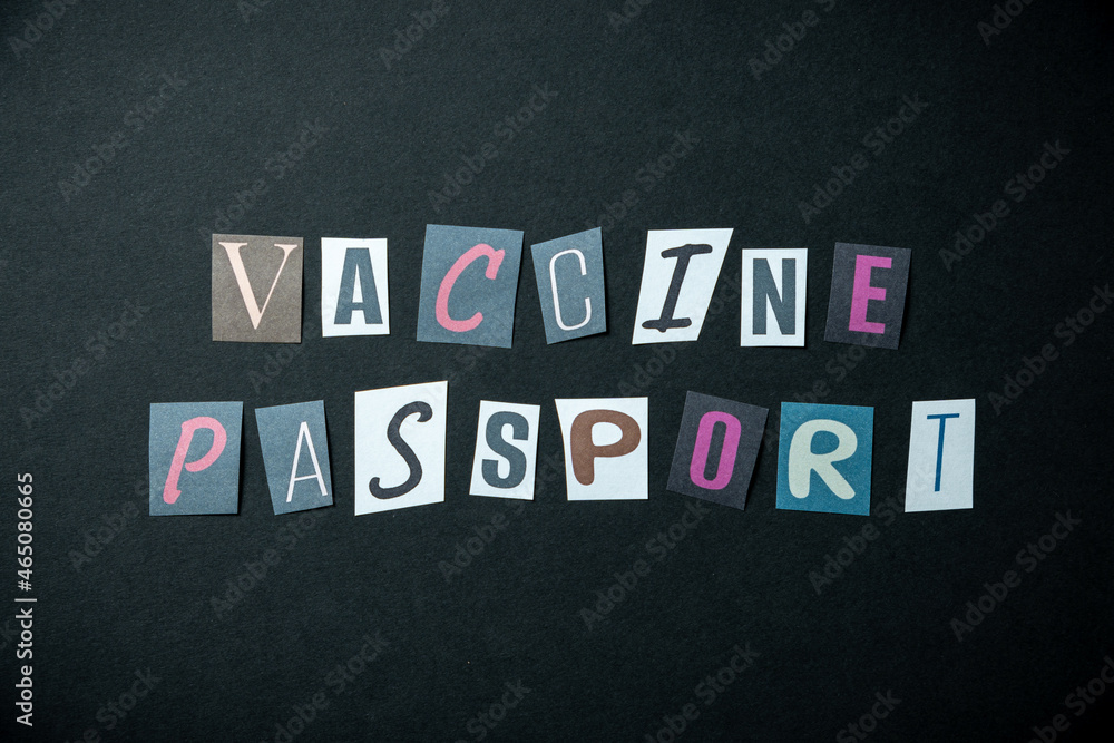 Vaccine passport words. Caption, heading made of letters with different fonts on a dark background. Vaccine passport words. Caption, heading made of letters with different fonts on a dark background.