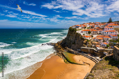 Azenhas do Mar is a seaside town in the municipality of Sintra, Portugal. Close to Lisboa. Azenhas do Mar white village, cliff and ocean, Sintra, Portugal. Azenhas Do Mar, Sintra, Portugal. photo