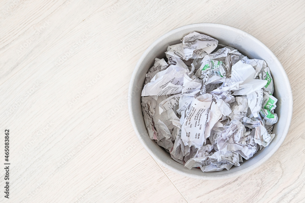 Used sales receipts prepared for recycling. Recyclable materials. Waste