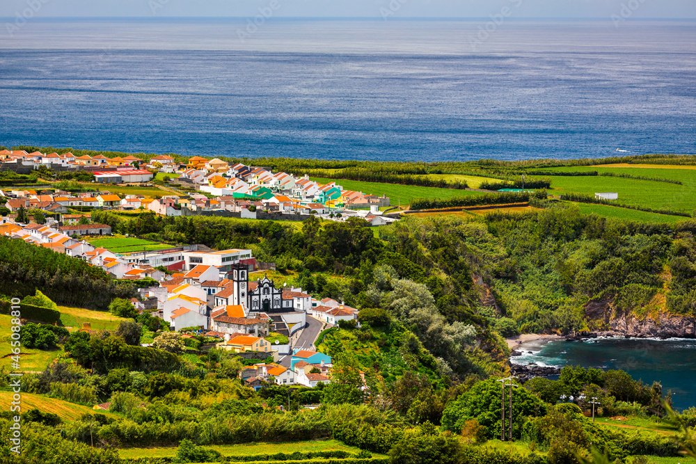 Beautiful nature view on Azores with small villages, tows, green nature fields. Amazing Azores. View of typical Azores village in Sao Miguel island, Azores, Portugal.