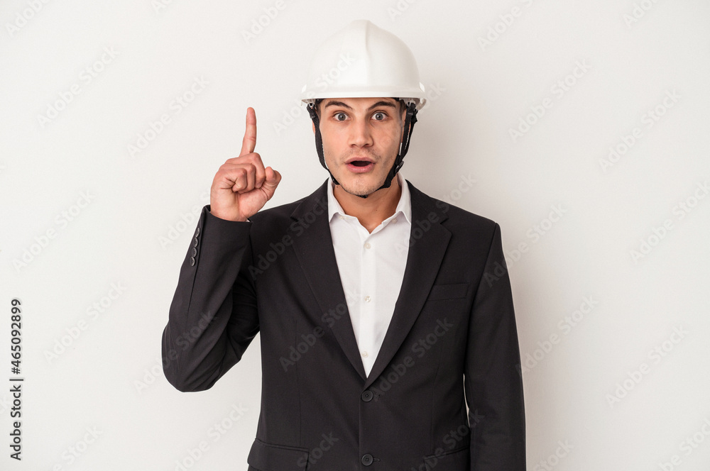 Young architect caucasian man isolated on white background having an idea, inspiration concept. Young architect caucasian man isolated on white background having an idea, inspiration concept.