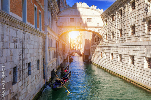 View of the famous Bridge of Sighs in Venice, Italy. Traditional Gondola and the famous Bridge of Sighs in Venice, Italy. Gondolas floating on canal towards Bridge of Sighs 