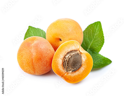 Sweet apricots with leaves photo