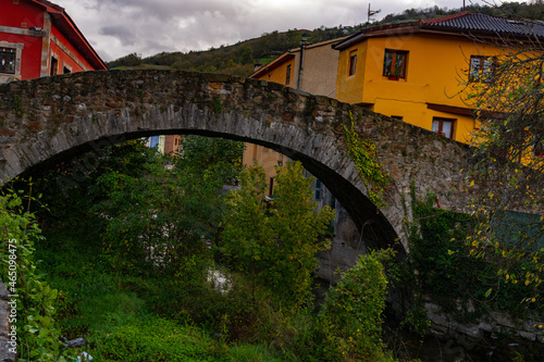 Medieval bridge over the Villoria river photo